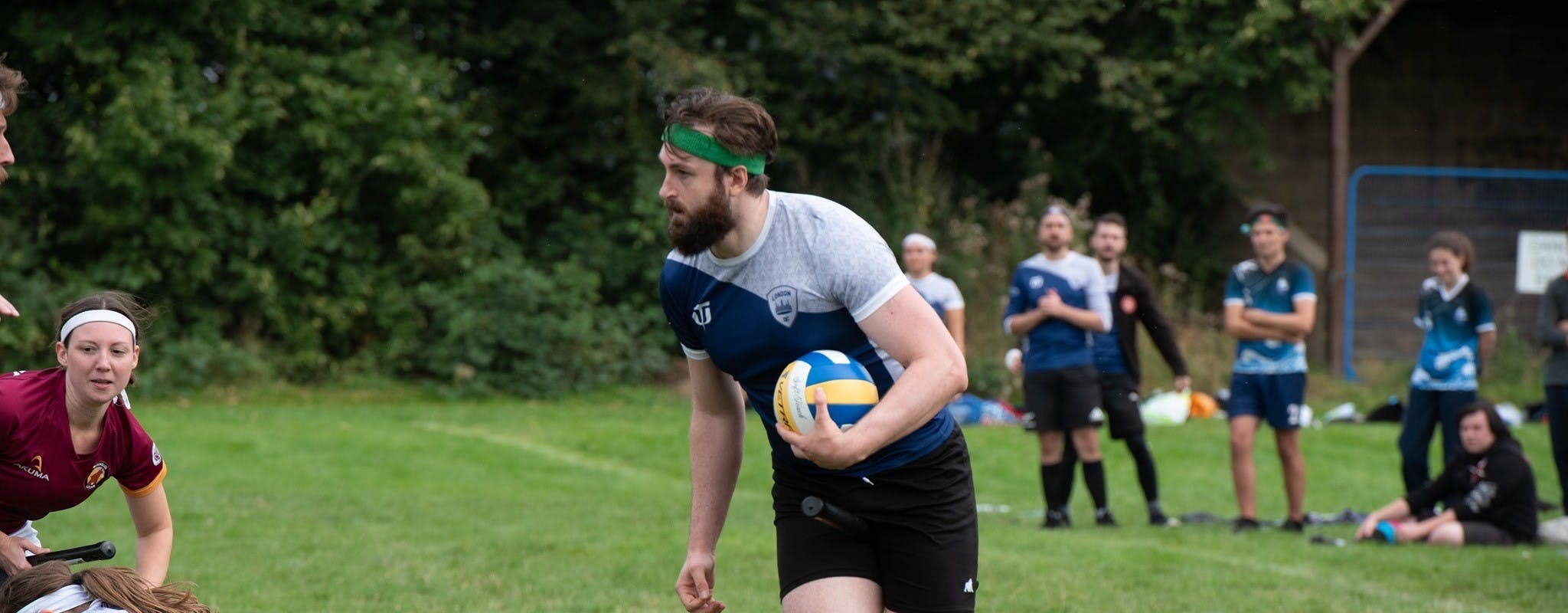 Dec Ramsay playing as keeper for London Quidditch Club, running with the quaffle